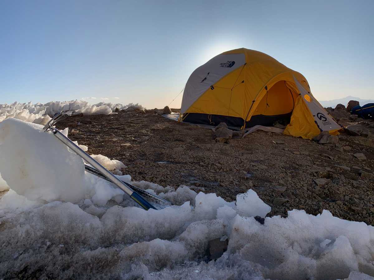 A mountaineering tent set up at the foot of the Illimani glacier at 18,000 ft.